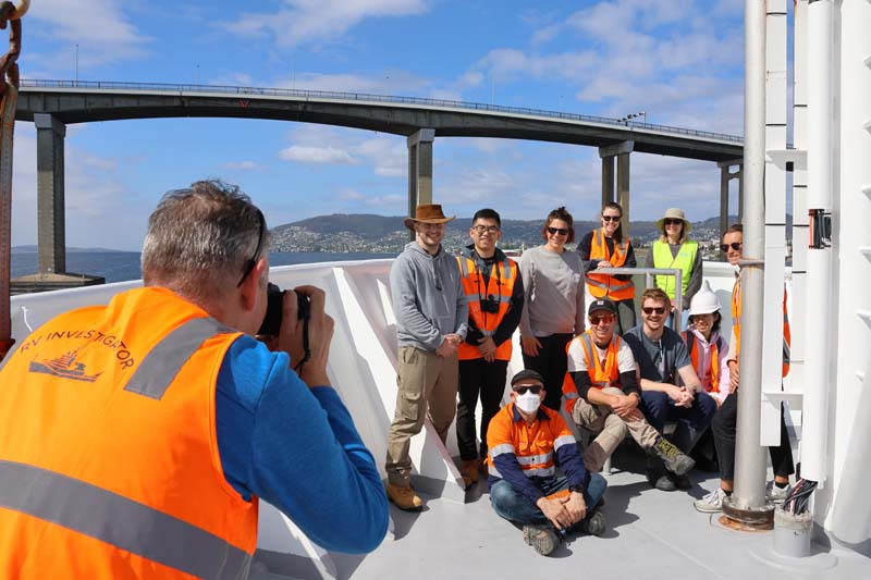 RV Investigator crew taking a group photo