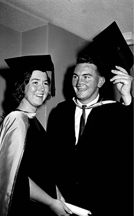 Michael Lynch with fellow graduate Nola Fisher on graduation day, 9 April 1964.