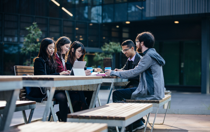 Group of students on outdoor table