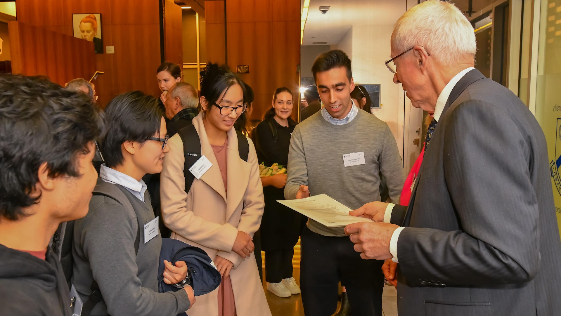 The Hon Christopher Jessup KC hands over his Fiat Justitia 2024 lecture to members of the Monash University Law Review editorial team