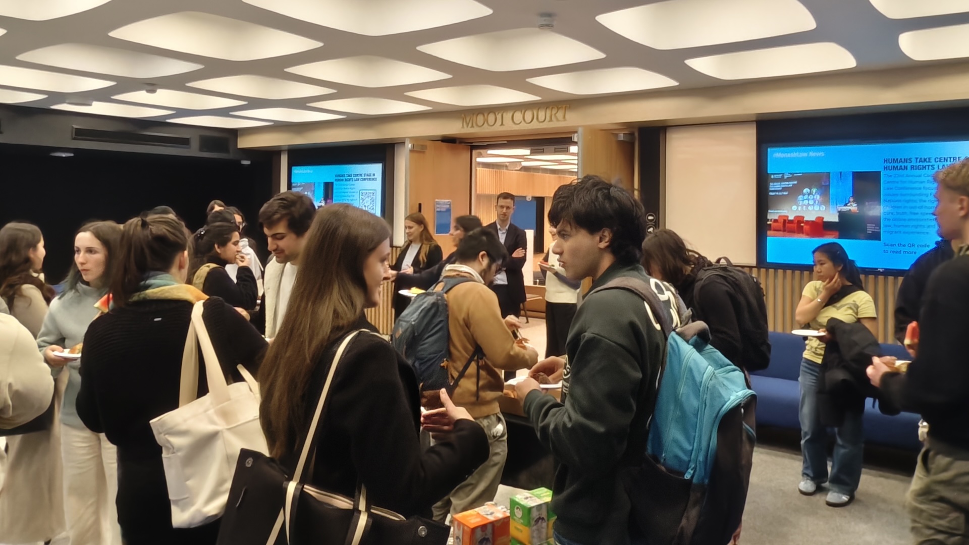 Monash Law Students mingle after ABL Lecture in Moot Court