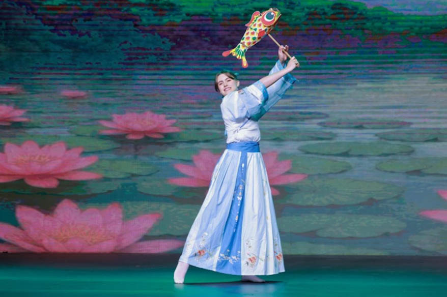 Ava performing on stage