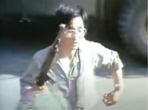 Figure 2: Kwangju citizens arm themselves to fight the army (CBS News screenshot)