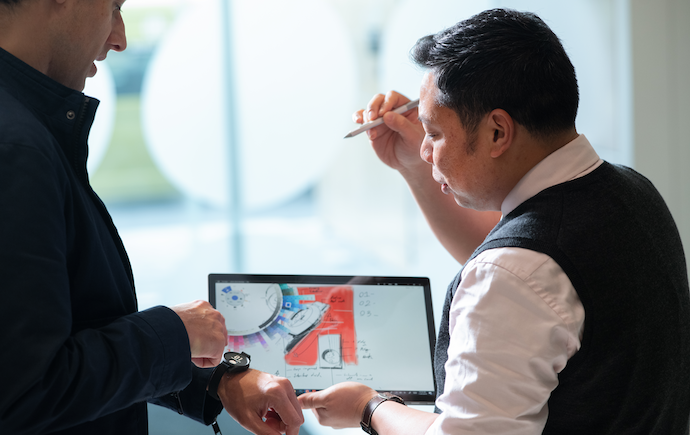 health professional showing client their results on an ipad