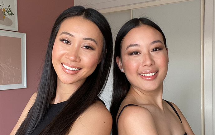 Estefania Tchung and Elizabeth Le standing back to back