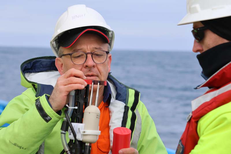 Scientists using measuring instruments