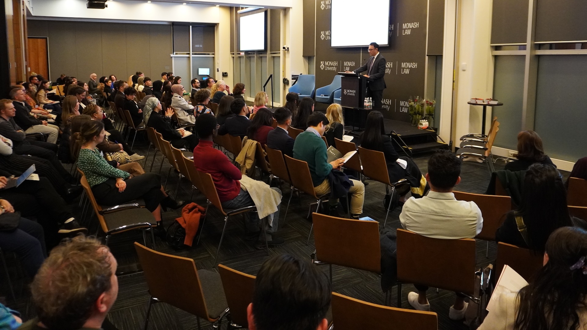 Ambassador of Afghanistan to Australia, His Excellency Wahidullah Waissi delivering a keynote speech at the launch of the Handbook on Universal Jurisdiction.