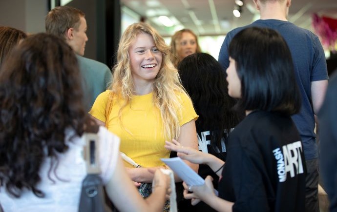 Student talking to a Monash course advisor