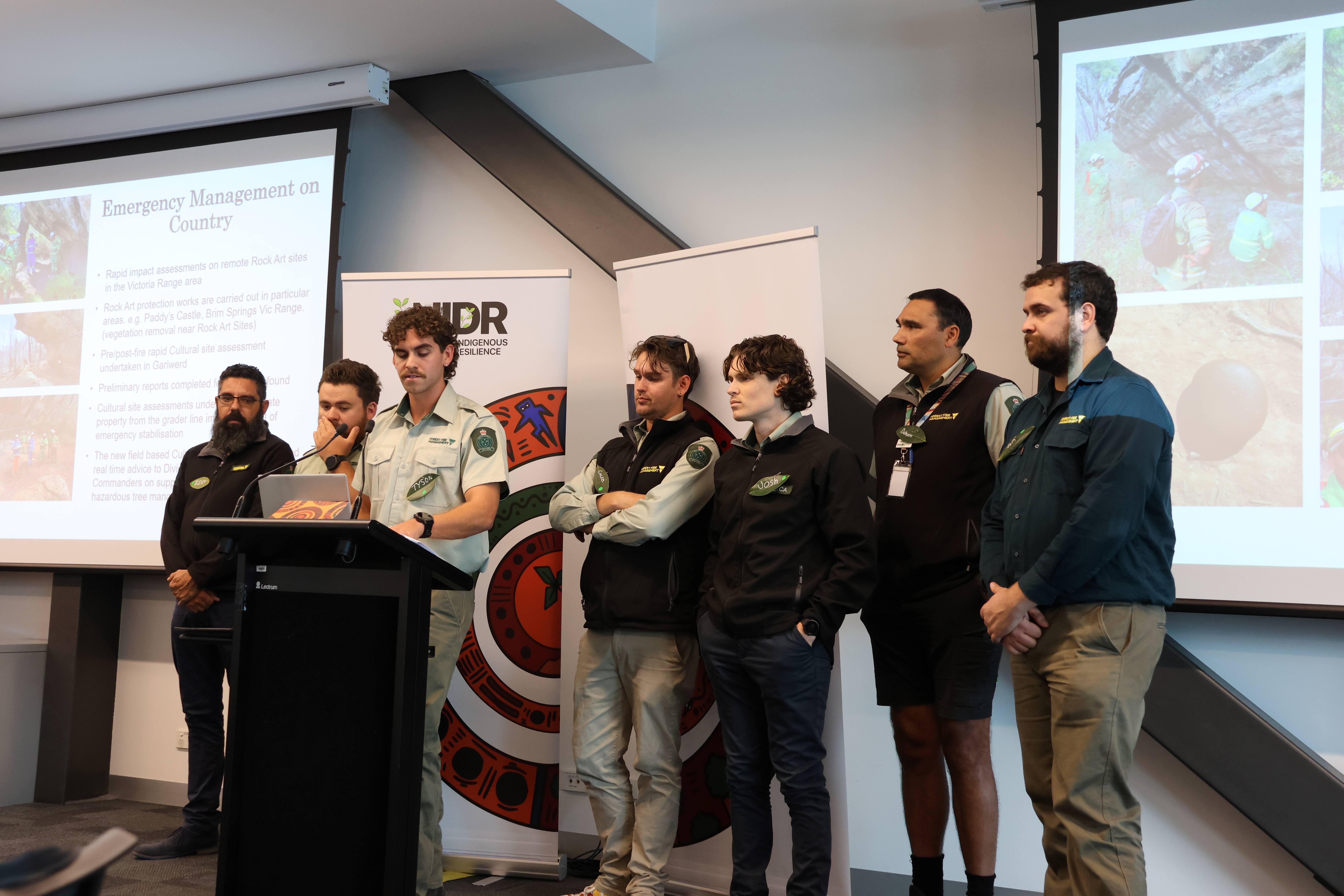 Photo of members of the Forest Fire Management Victoria team presenting at Victorian Policy Roundtable, May 2025