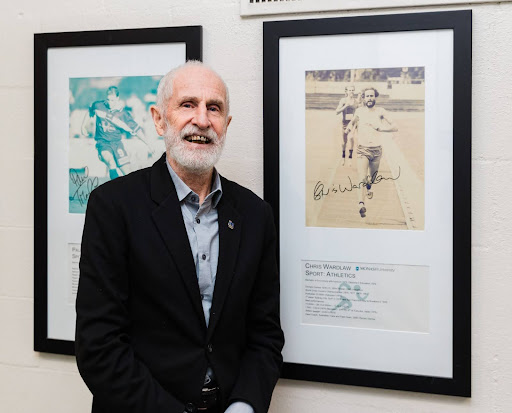 Chris Wardlaw PSM OLY with his plaque at the Monash Sport Hall of Fame