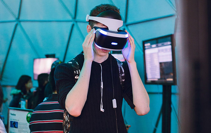 Student wearing virtual reality headset