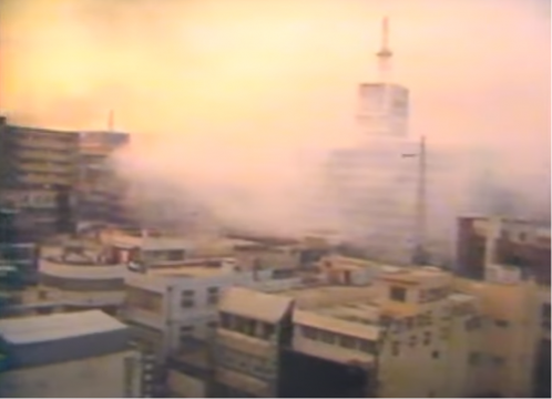 Figure 3: Kwangju on fire at the height of the fighting (CBS News screenshot)
