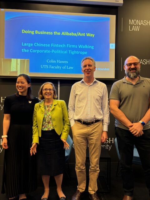 Standing on stage: Jenny Chen, Professor Jennifer Hill, Associate Professor Colin Hawes and Associate Professor Steve Kourabas