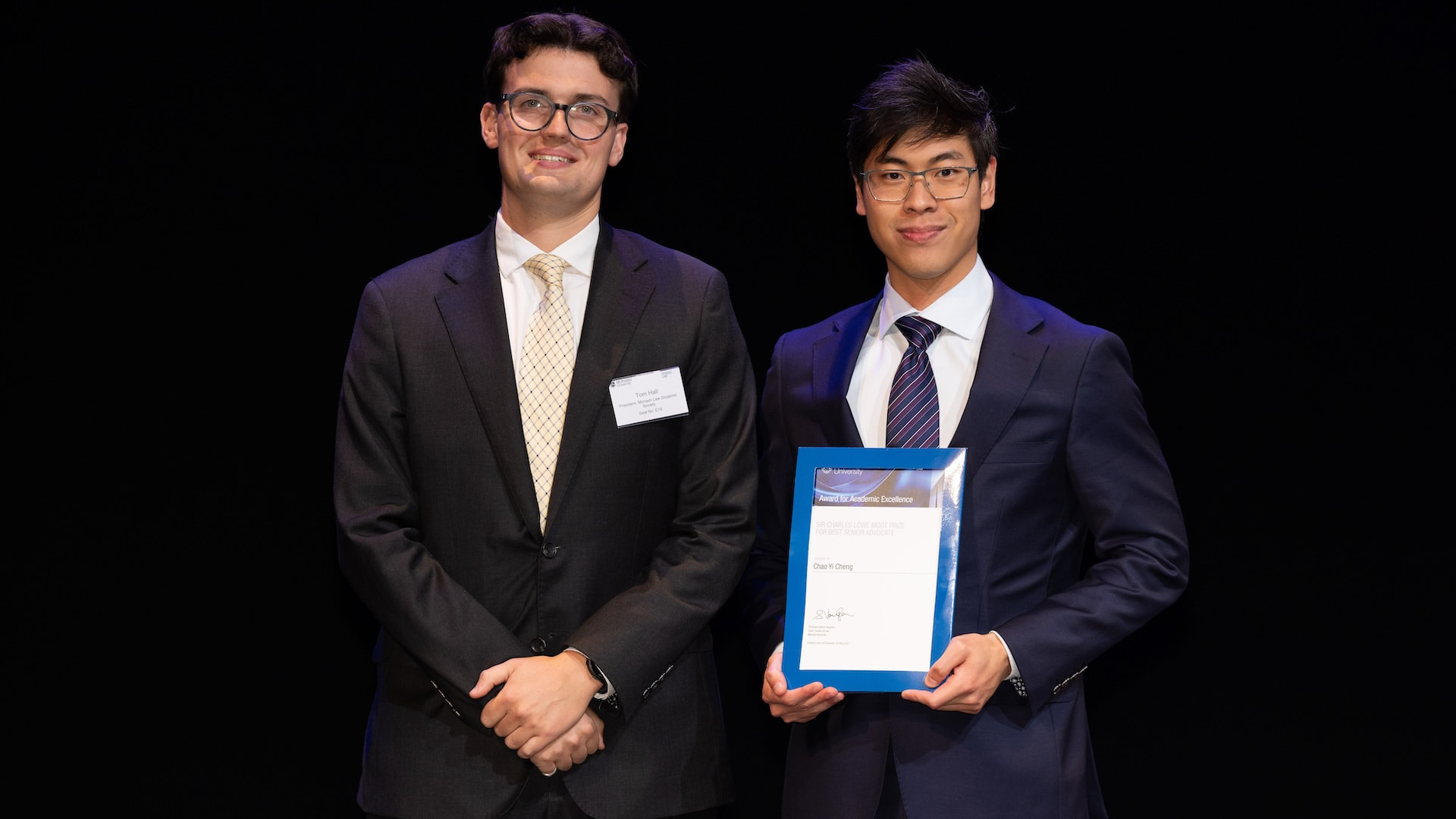 Thomas Hall from Monash Law Students&rsquo; Society and Chao Cheng.