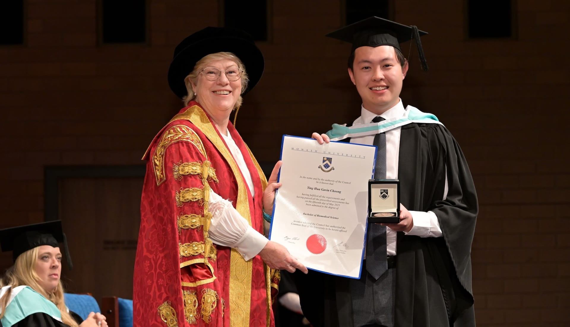 Gavin Choong receives his Graduation award