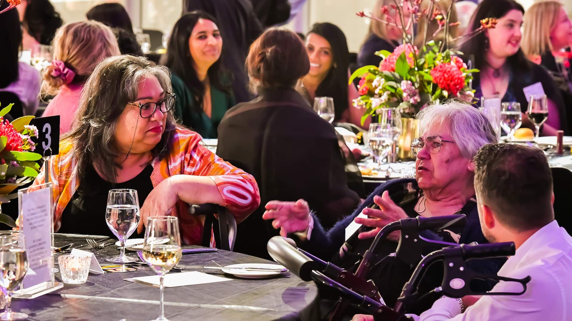 Commissioner Singh&rsquo;s sister Jeanette and mum Diane at the 2025 Monash Law Gala Dinner.