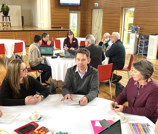 MACS teachers and research team table discussions at MACS PL3
