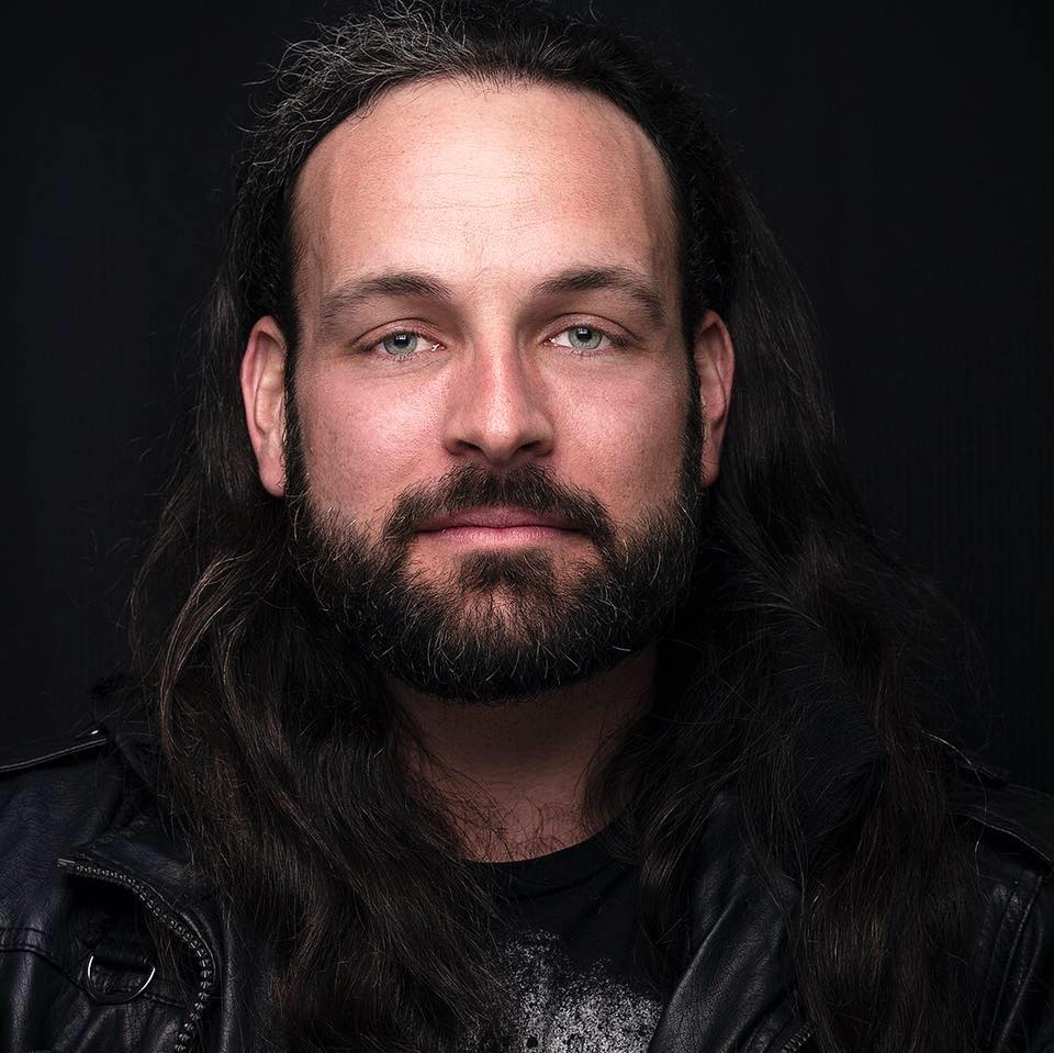 A portrait of Mitch Alexander