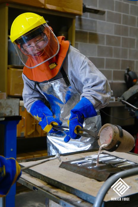 Wenjing - Monash Forge - Casting molten metal into ingots