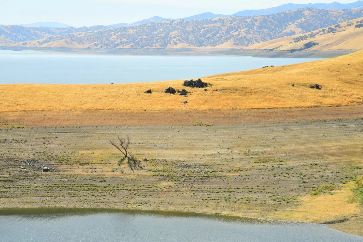 Landscape with reservoir in fore and backgrounds
