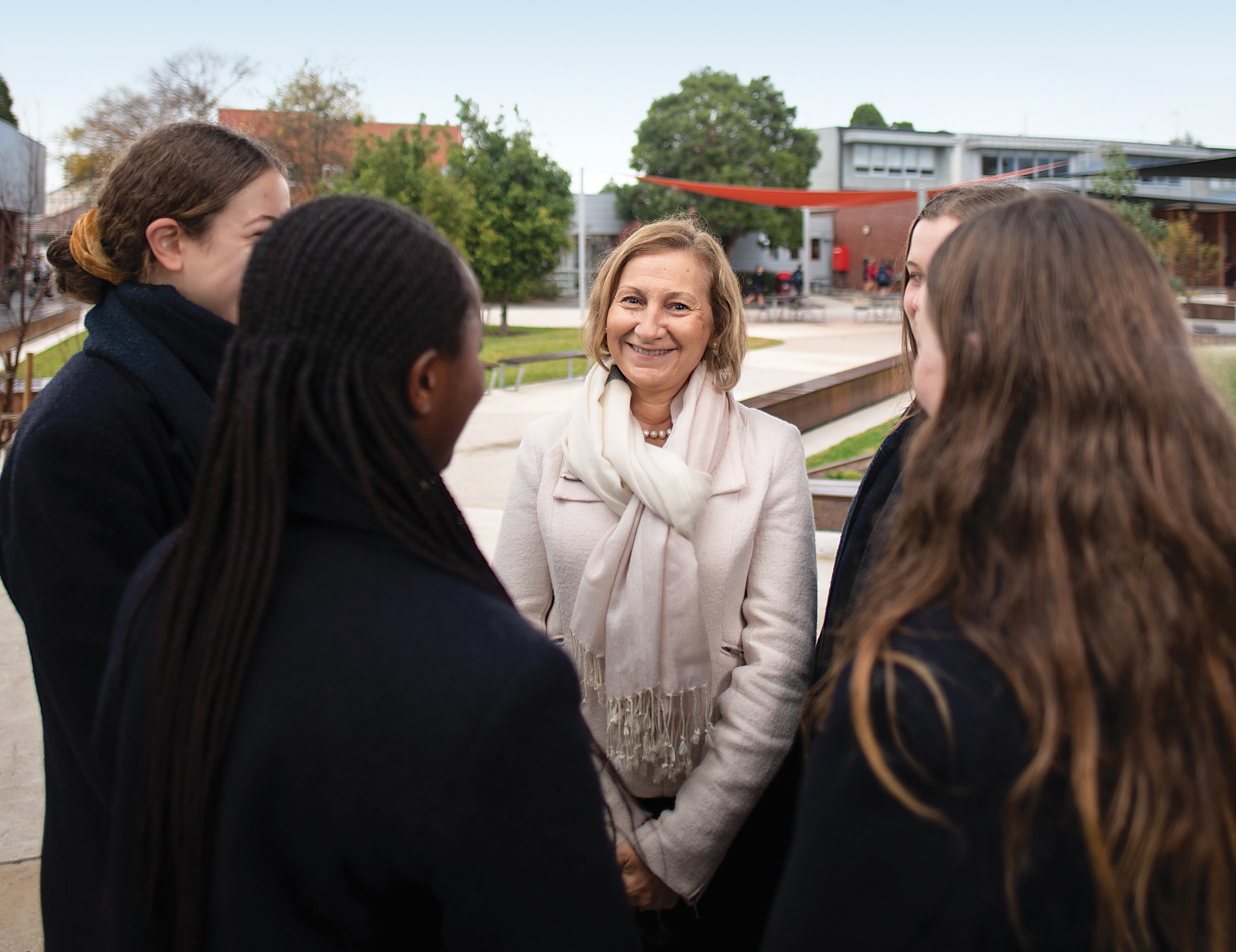 Pitsa Binnion talking to a group of students