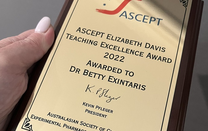 Betty holding the ASCEPT Elizabeth Davis Teaching Excellence Award
