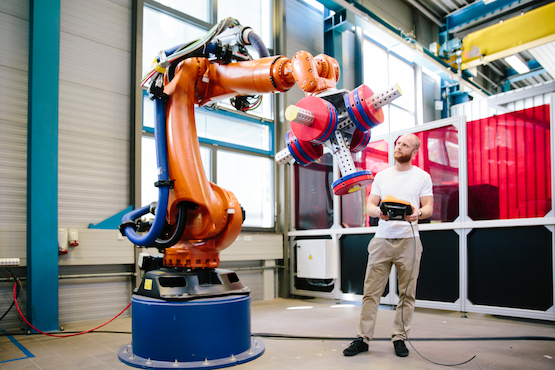 Man working with a robot