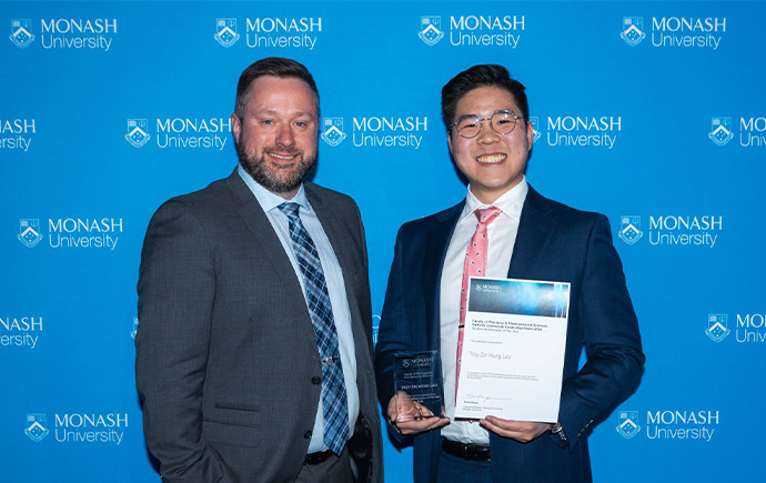 Troy Lau accepting the award