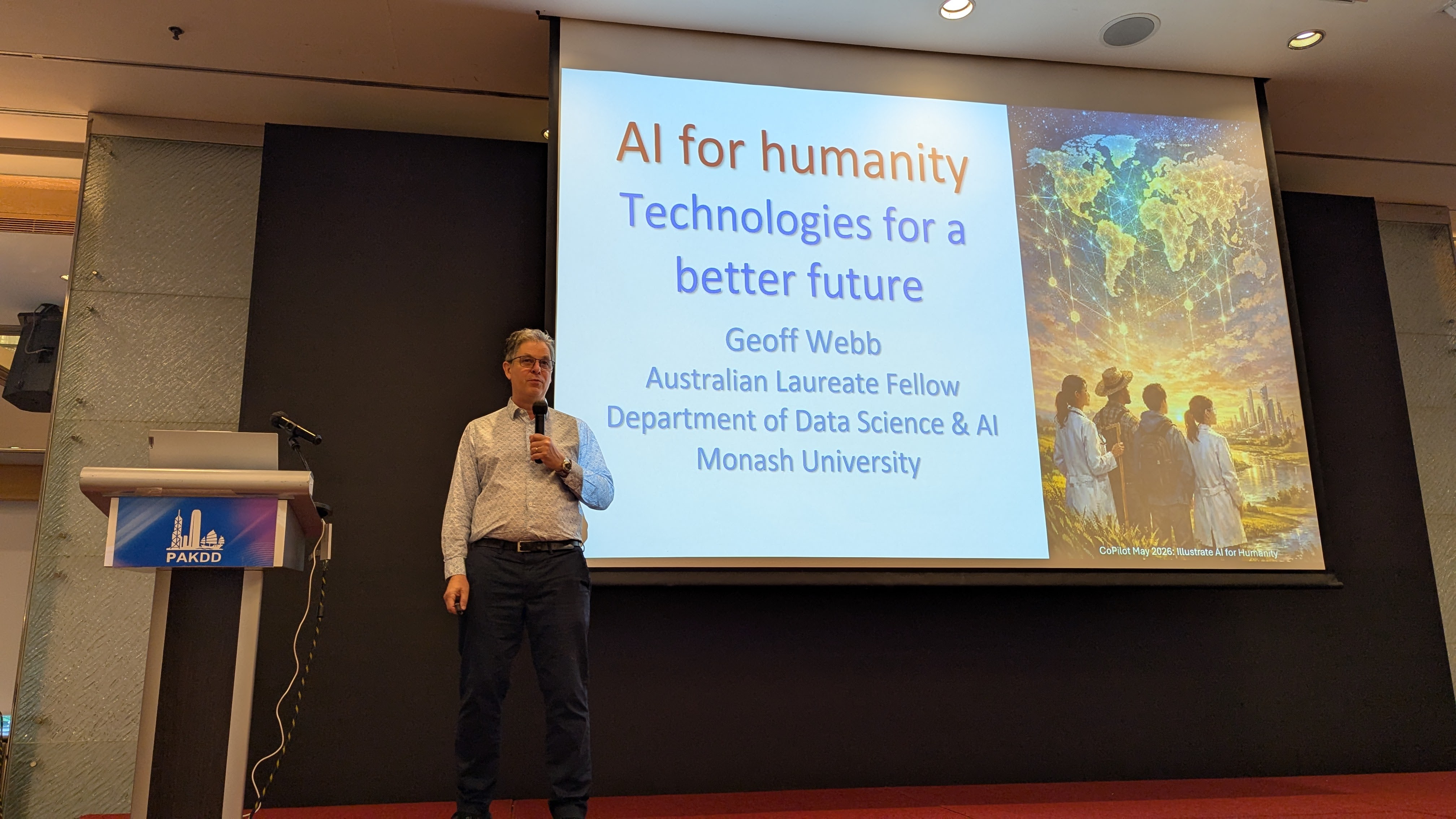 Photo of Geoff Webb presenting at PAKDD26