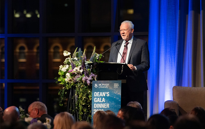 Dr David Brand presenting at the Monash Business School Dean’s Gala 2026.