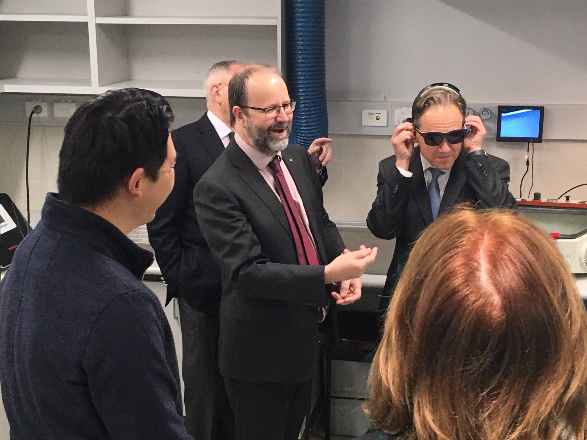 The Hon Greg Hunt MP, Minister for Health tries on the vision restoration headgear, Gennaris.