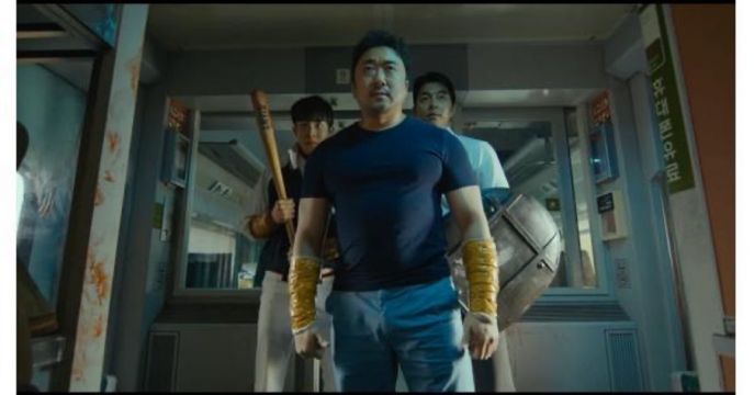 Figure 2: Yoon Sang-hwa (Ma Dong-seok) and Seok-woo (Gong Yoo) prepare to battle the zombies