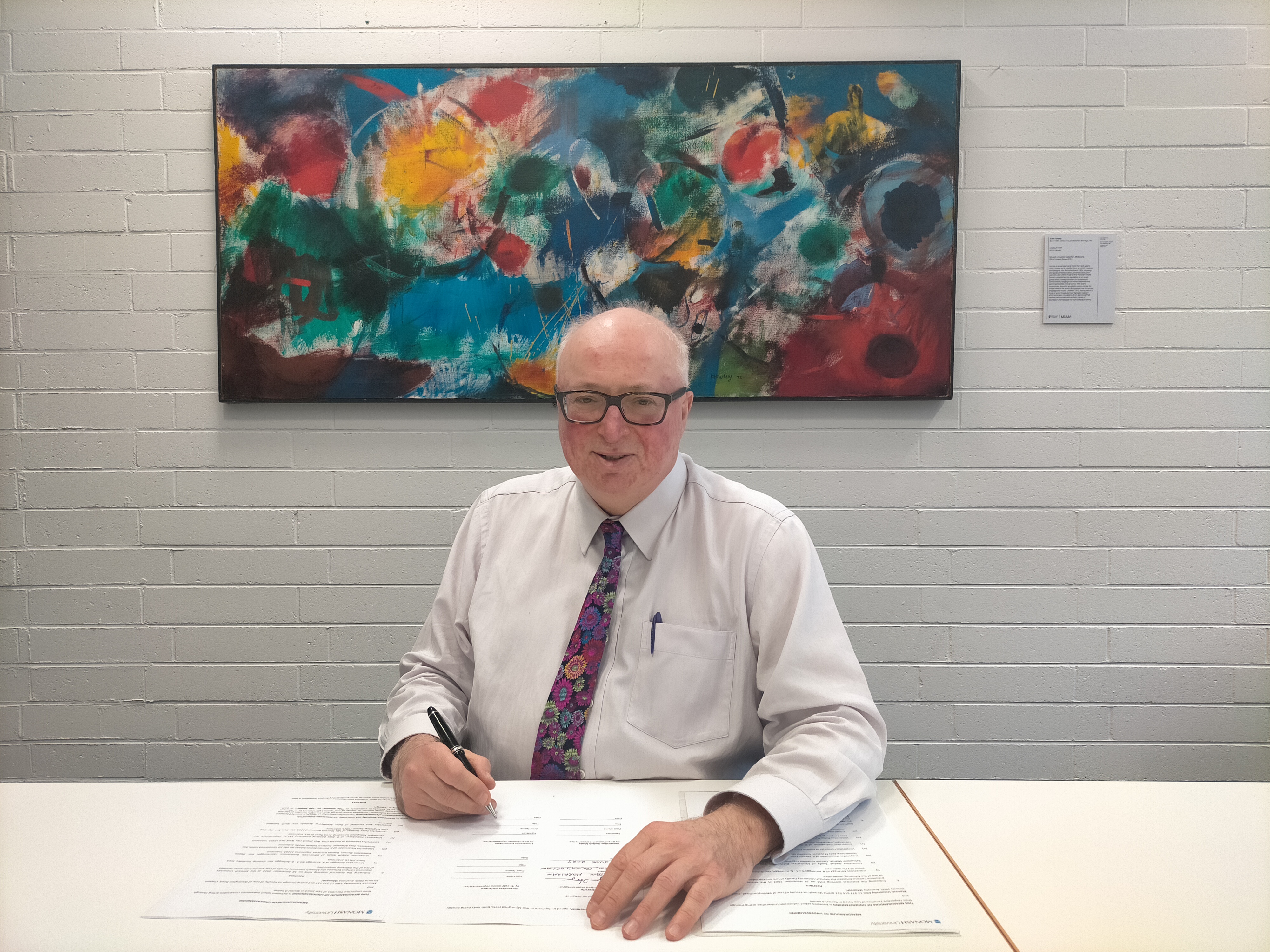 Dean Bryan Horrigan signing the Memorandum of Understanding for MULIA