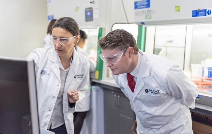 A MIPS researcher giving a demonstration to the Hon. Ben Carroll at the launch for the MMQPA