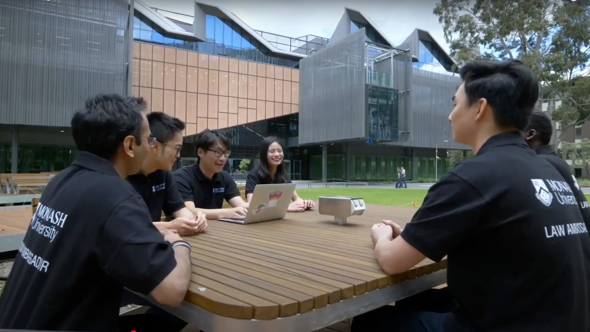 Monash Law students sitting around table