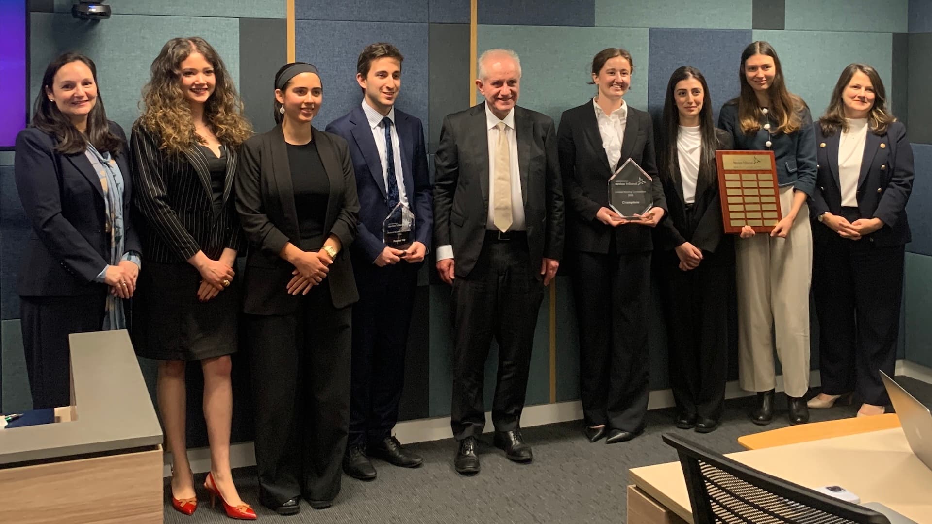 Senior Member Tamara Hamilton-Noy, Sara Scully, Shailee Carmeli, Wade Gittleson, Justice Kyrou, the winning team from the University of Melbourne and Deputy President Kruna Dordevic at the ART Melbourne Registry for the Grand Final