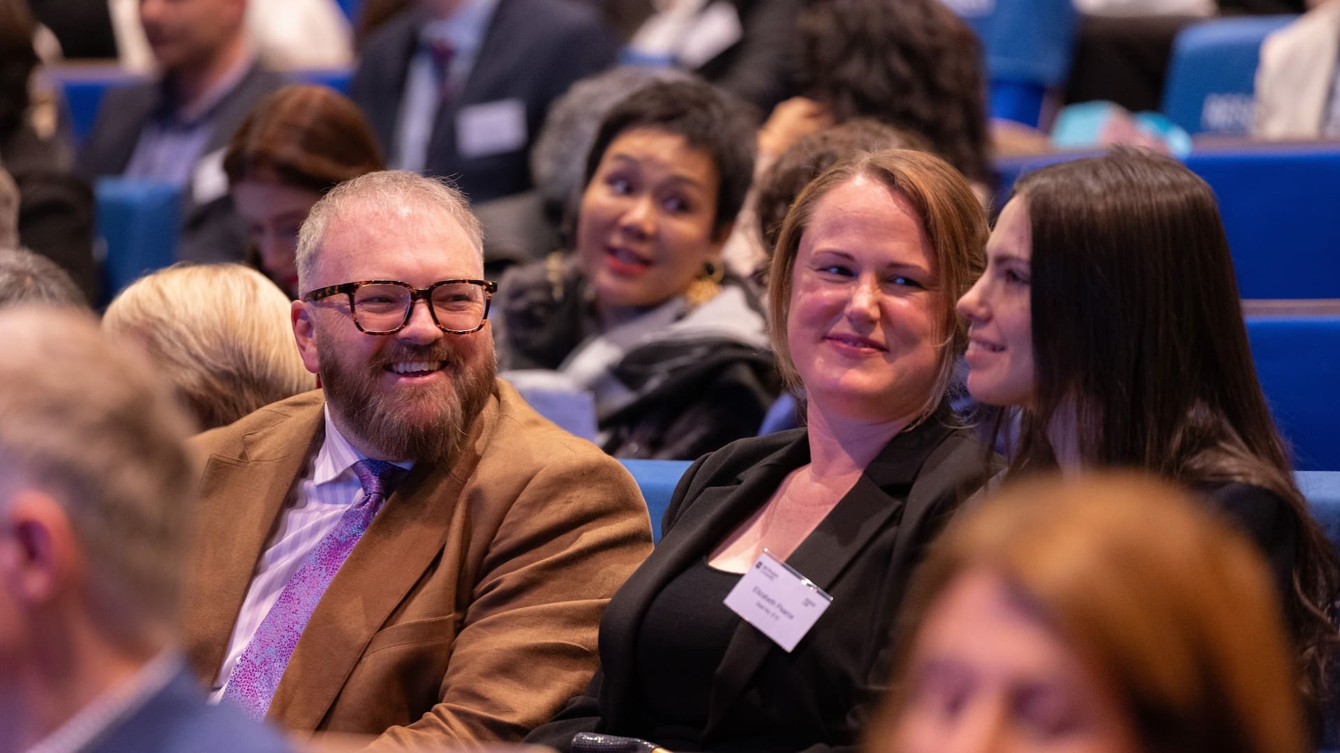 Professor Steven Vaughan with the Chief Justice Marilyn Warren AC KC Prize for Best Juris Doctor Student, Elizabeth Pearce and Monash Faculty of Law Prize for Best Bachelor of Laws (Honours) Student, Grace Ficinus.