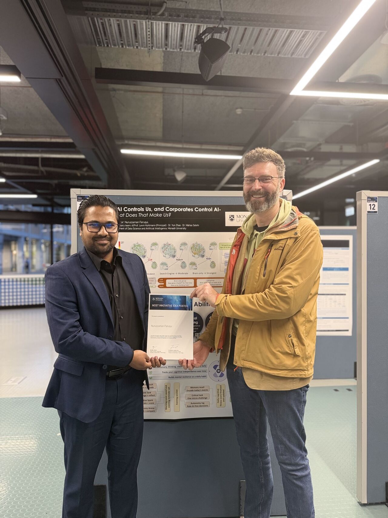 Photo of Zaman and Levin award presentation