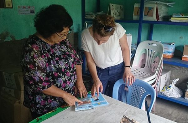 Dr Tori Oliver conduction an environmental Scan - Health Service, Myanmar