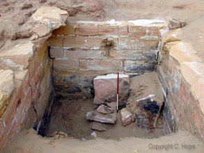 View of the North Stone Tomb, showing collapse at the west end of the subterranean burial chamber