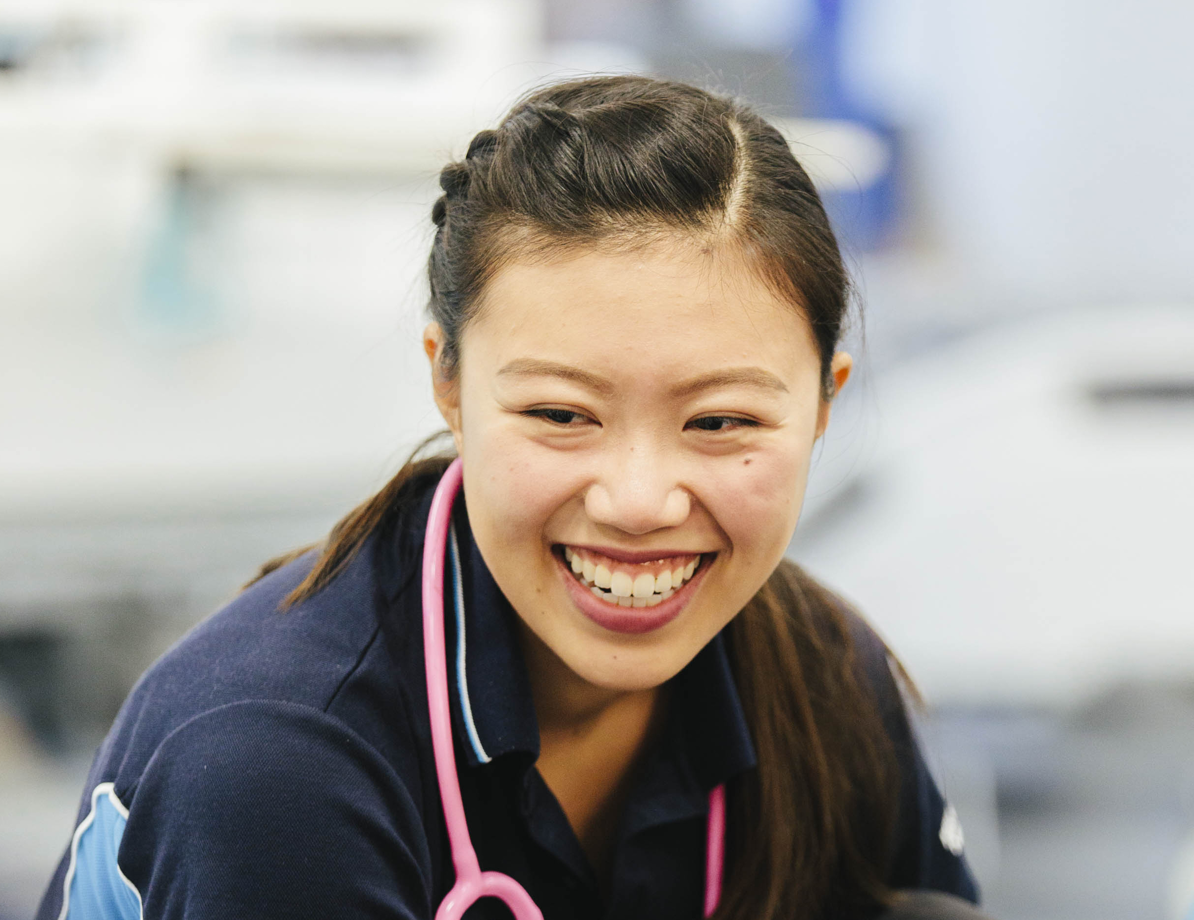 Student smiling in the labs