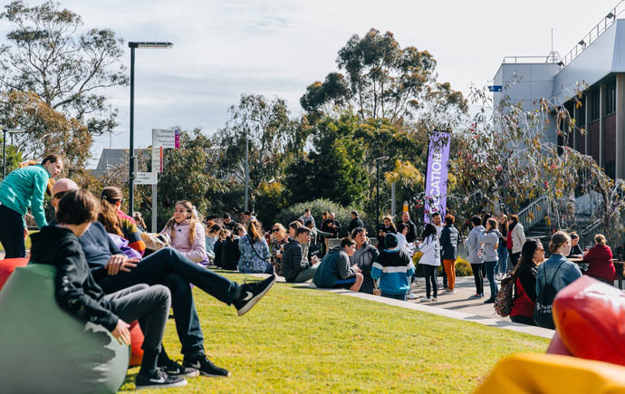 Students relaxing in beans bags at Peninsula campus