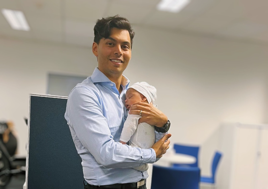 Father holding baby