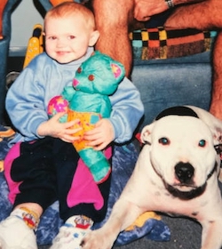 Courtney aged 2 with her Uncle's dog