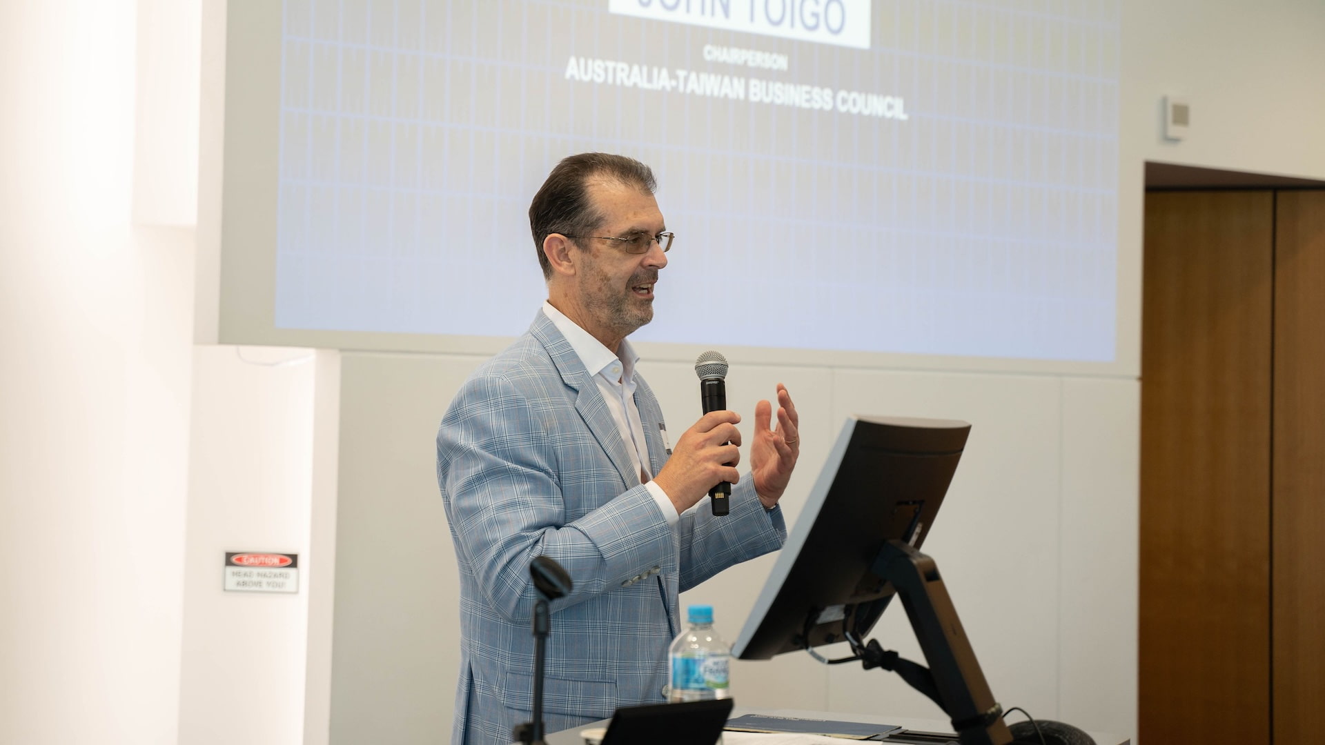John Toigo, Chair, Australia-Taiwan Business Council presenting opening remarks at the Australia-Taiwan Sustainable Finance Roundtable In Brisbane.