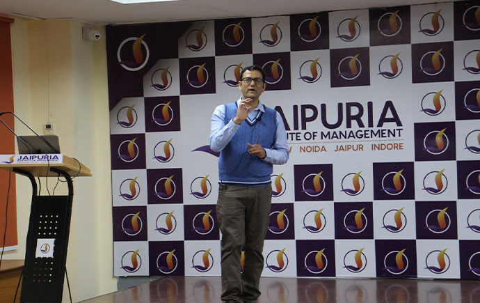 Vinod Mishra presenting a seminar on research.