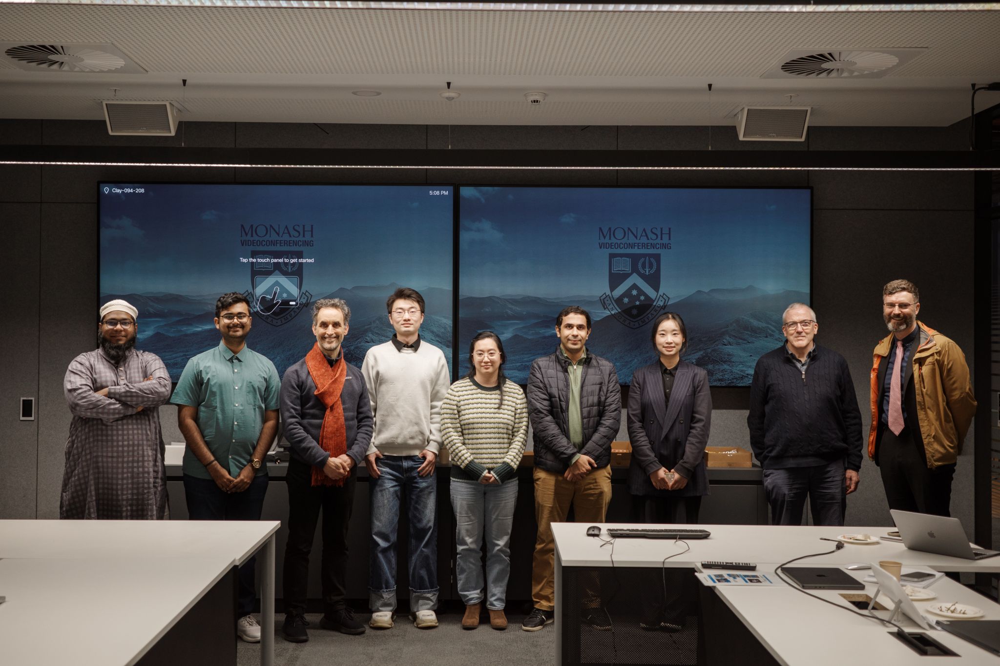Photo of people at 3 minute thesis