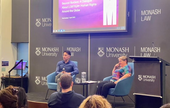 Sav Tanhchareun and Paula Gerber seated in conversation on stage from another angle