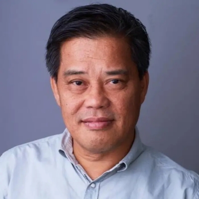 Headshot photo of Carlos H. Conde.