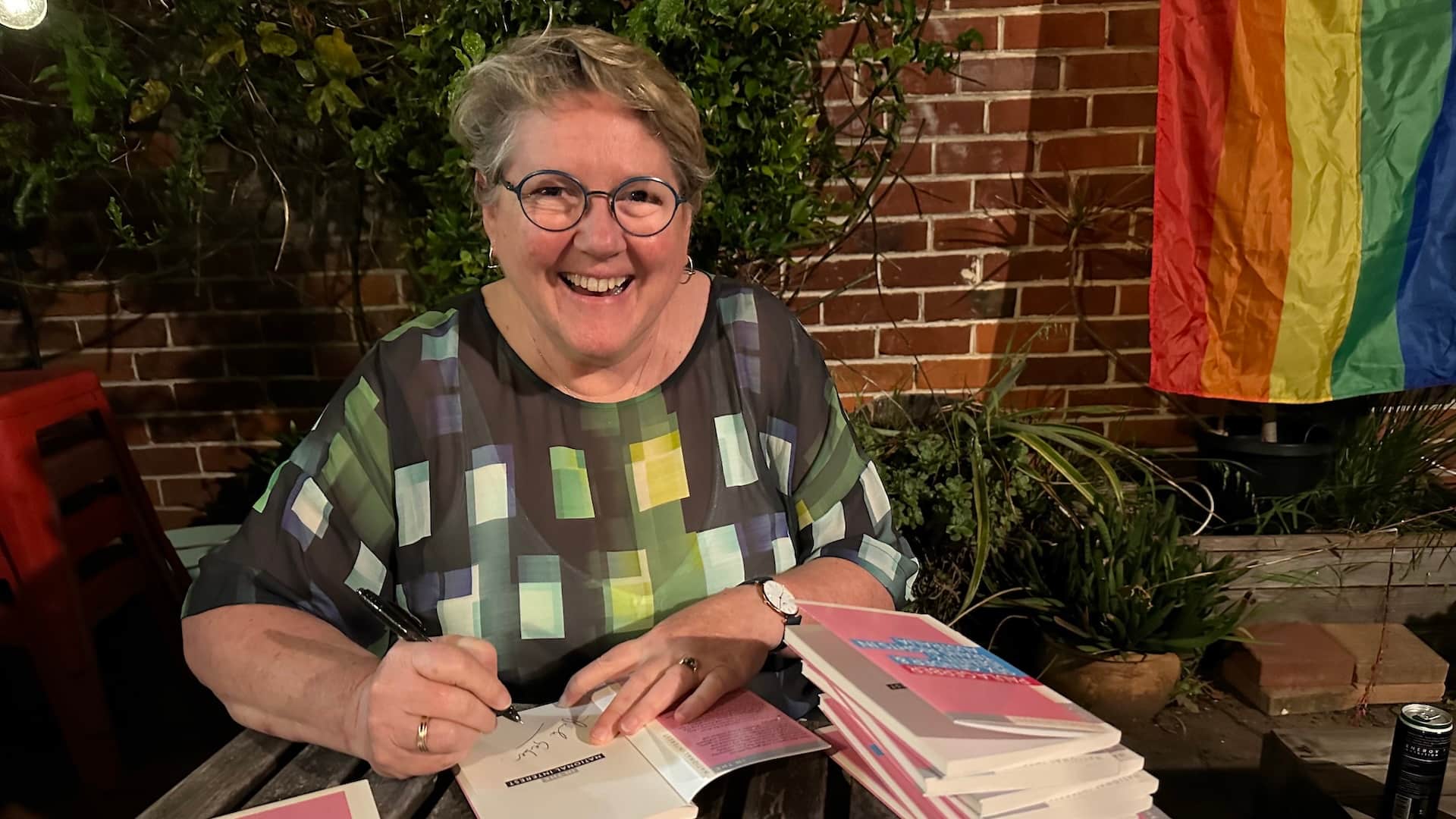 Paula Gerber signing her book